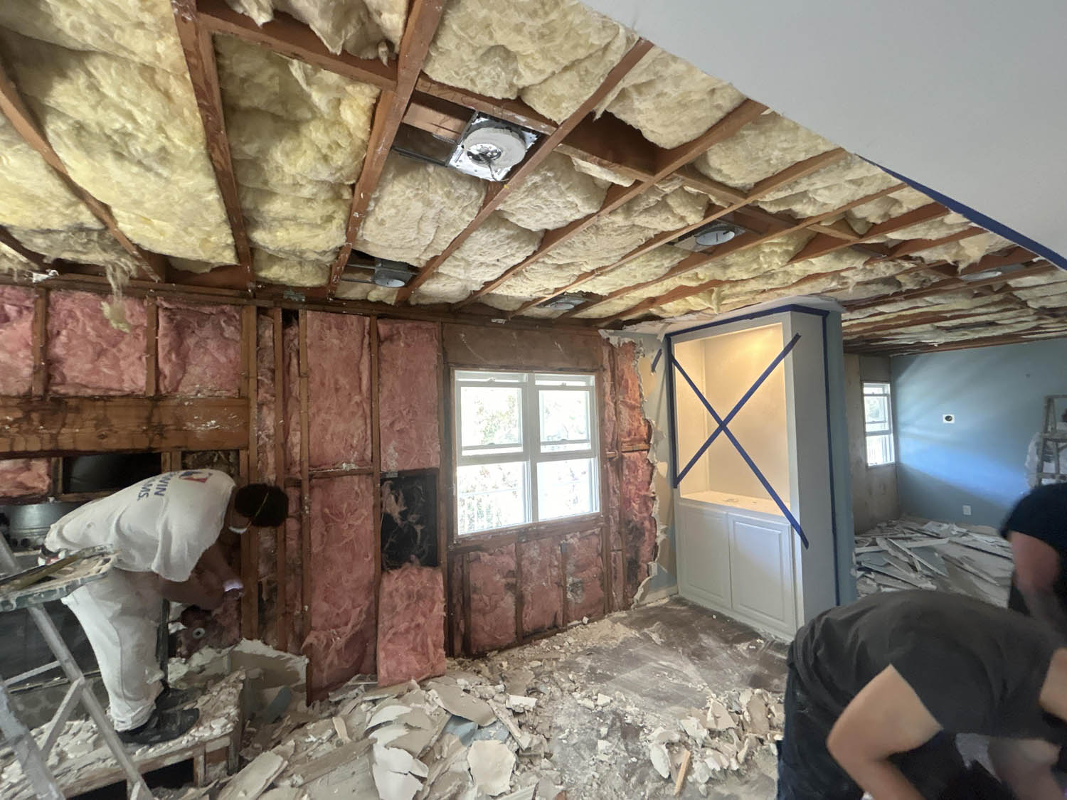 Water Damage Mitigation and Demolition Work Exposed Ceiling with Insulation